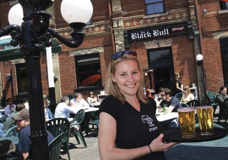 Rene Paquette serves up the suds at the Black Bull.