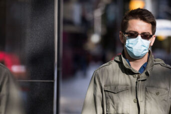 A photo of a person wearing a mask in Toronto in October 2020 during the COVID-19 pandemic