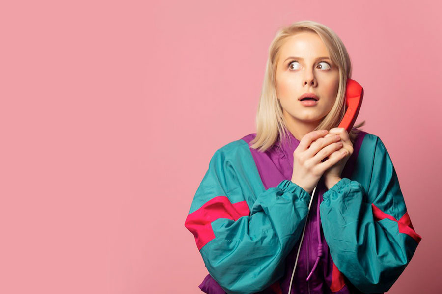 A photo of a person on the phone for a story about zoom fatigue