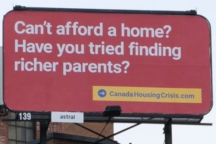 A billboard that says you need rich parents to purchase Toronto real estate