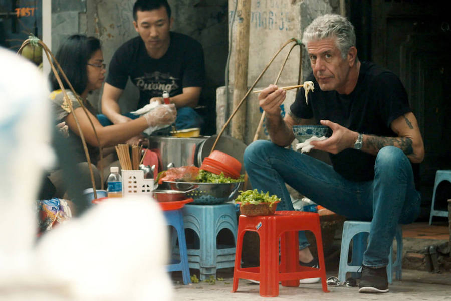 Anthony Bourdain eats by the side of the road in Roadrunner