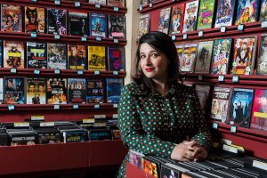 Chandler Levack takes in the wares at Eyesore Cinema while discussing her TIFF 2022 movie I Like Movies