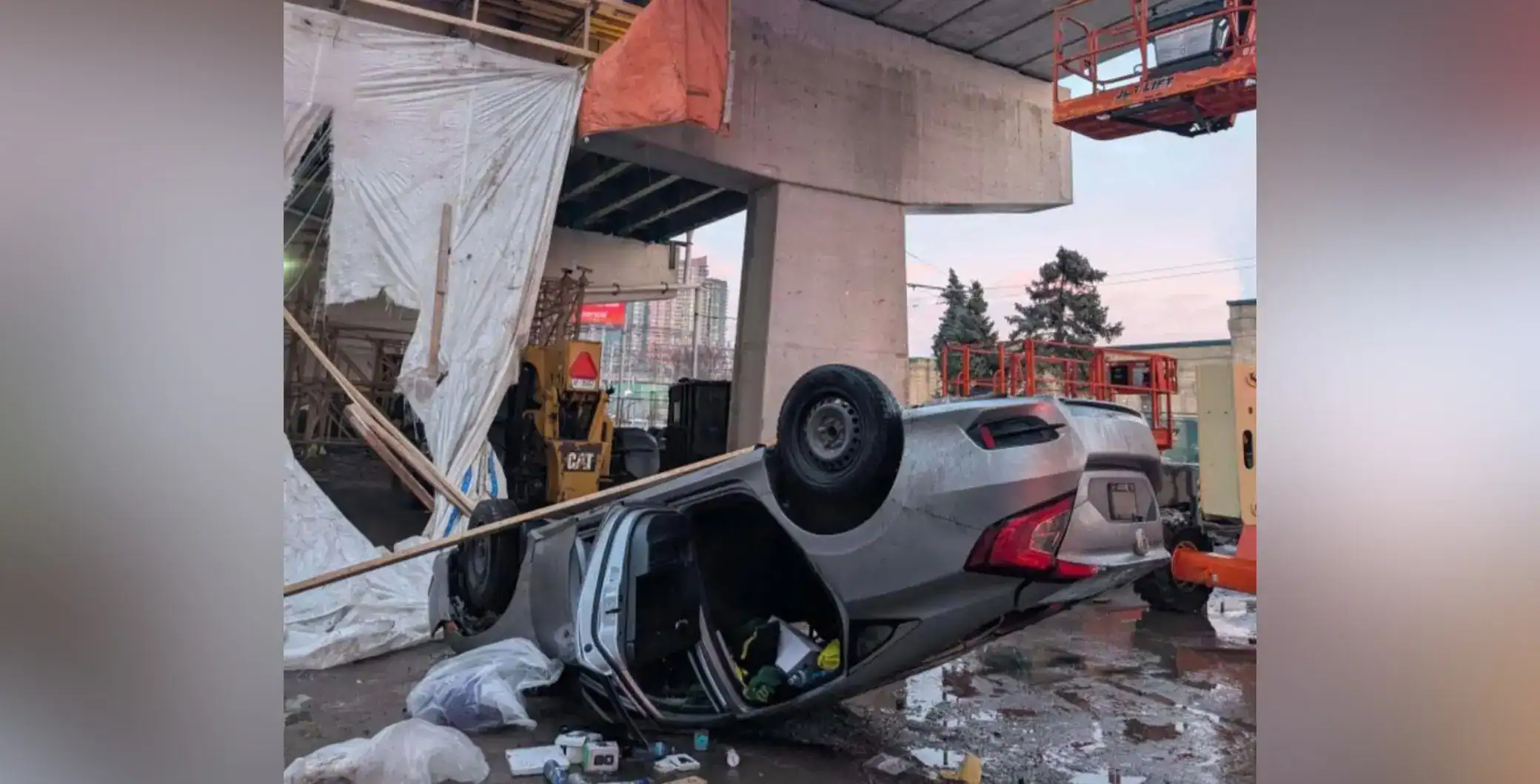 Man charged with drunk driving after car falls through hole on the ...