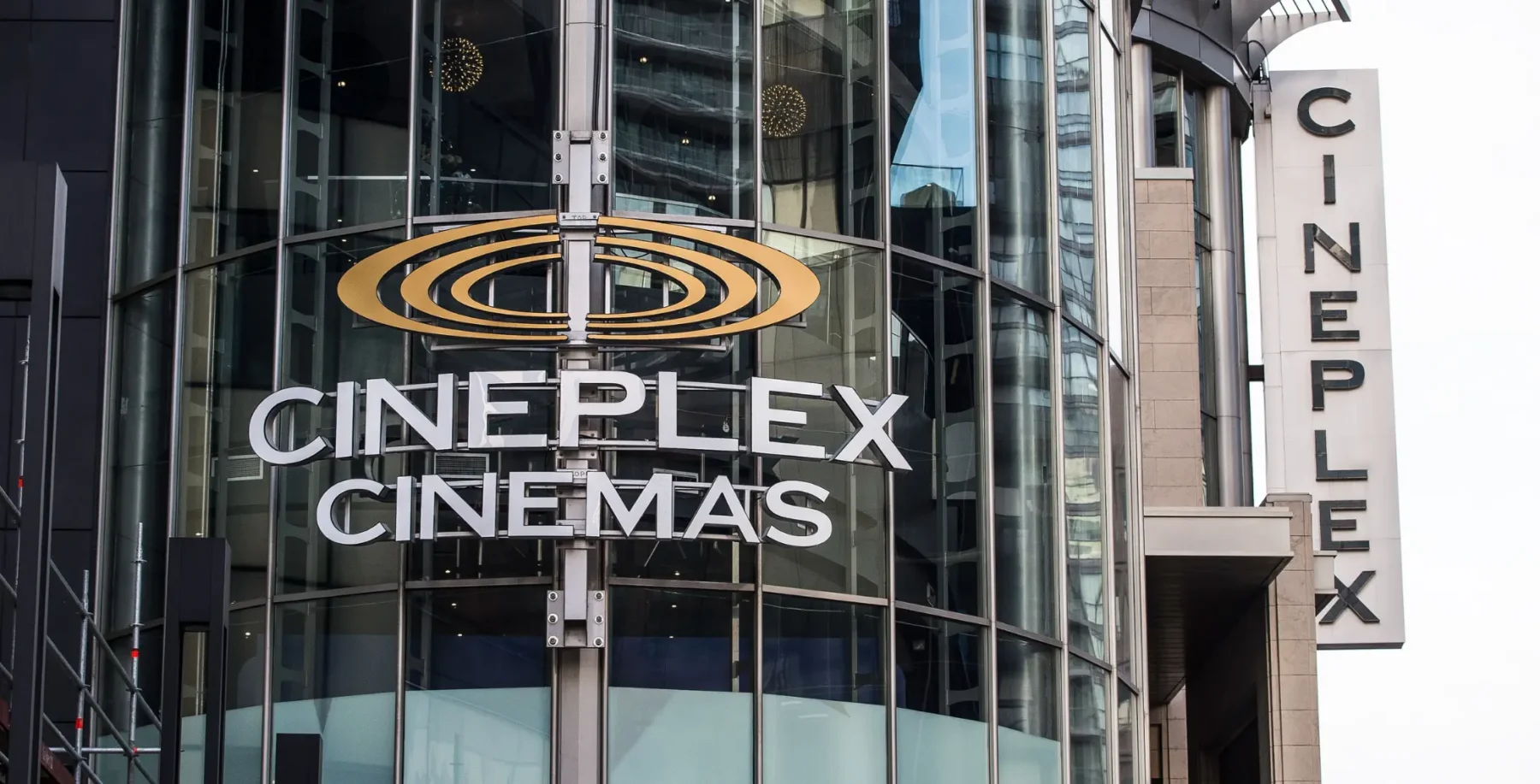 Cineplex Cinemas in Toronto on Bay Street with modern glass facade and digital signage for entertainment venues.