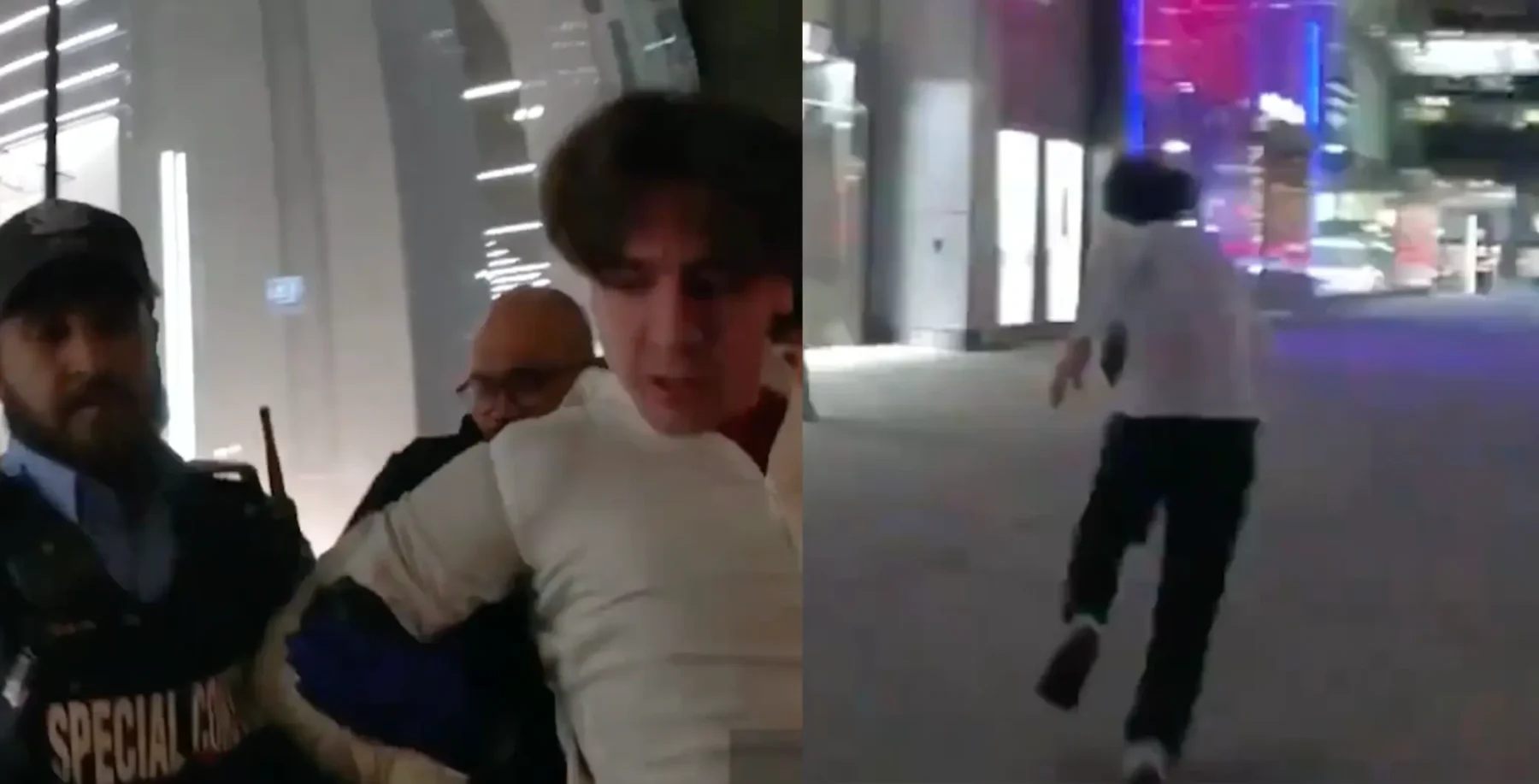 Clash between a man and security personnel inside a modern building in downtown Toronto at night.