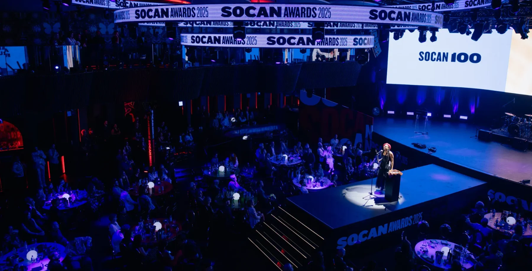 Festival awards ceremony at SOCAN Awards 2025 in Toronto, vibrant stage with live performances and audience, showcasing the Canadian music industry's celebration.