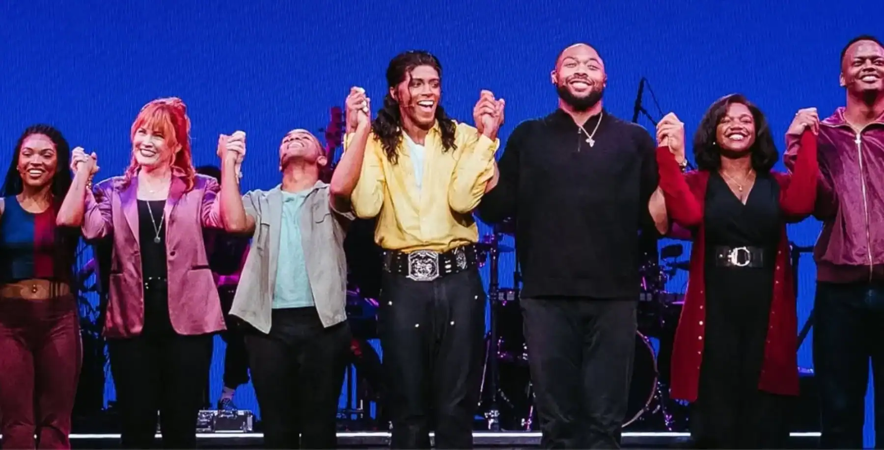 Diverse group of performers on stage at NOW Toronto event, celebrating arts and culture in Toronto, live performance, vibrant atmosphere, entertainment, local community.