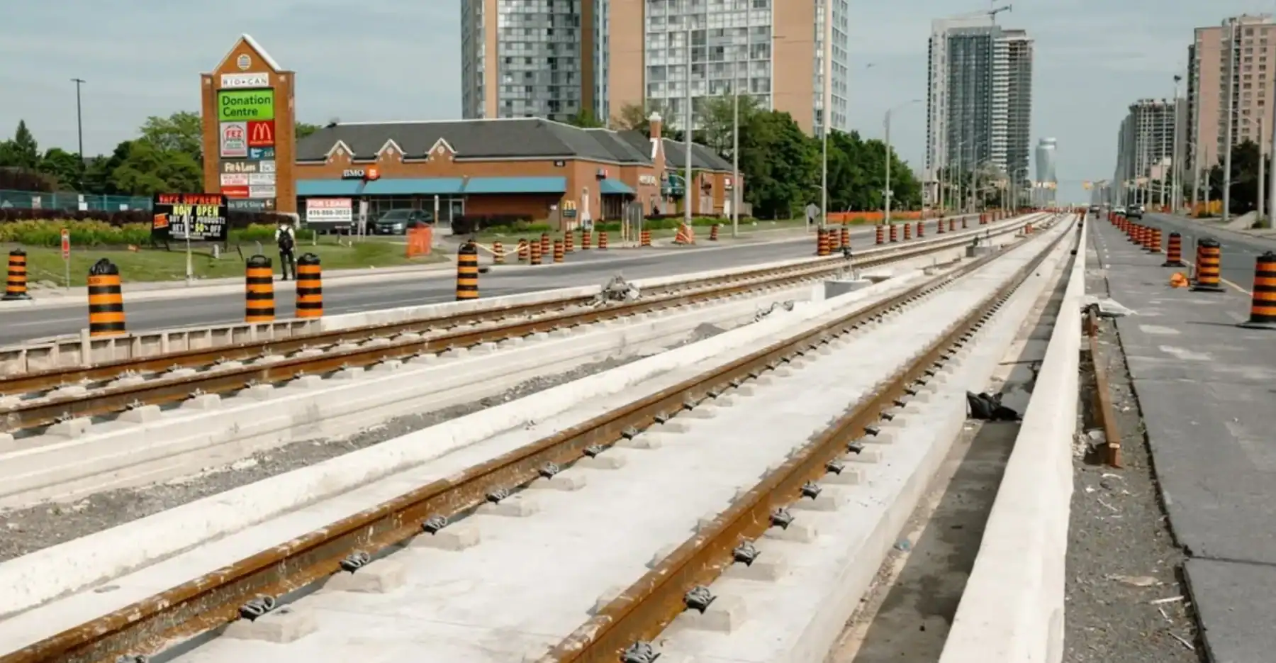 Construction of new Toronto streetcar or train tracks in the downtown area. Modern urban infrastructure development in Toronto, Canada.