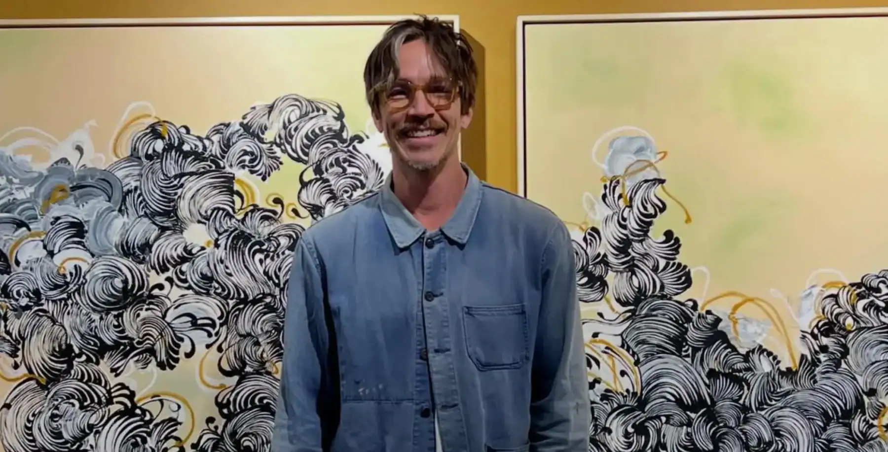 Vibrant Toronto art gallery featuring contemporary artwork and gallery visitors, showcasing diverse art styles and engaging cultural experiences in downtown Toronto.