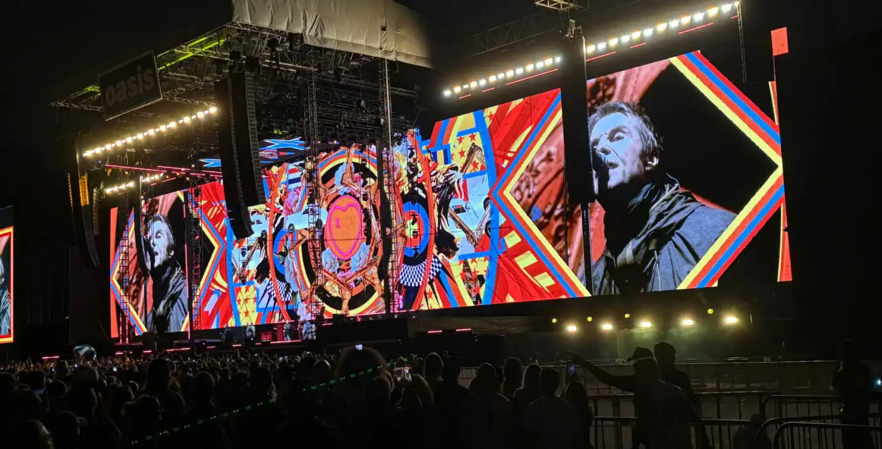 Vibrant outdoor music concert at night in Toronto with large LED screens and a lively crowd, showcasing Toronto's entertainment scene, live events, and culture.
