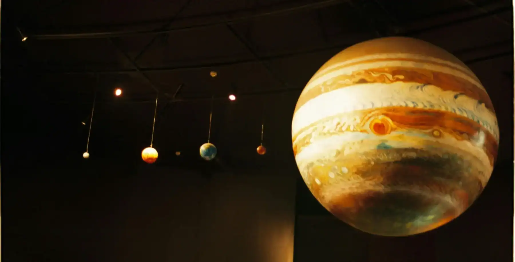 Colorful model of planets in the solar system on display at NOW Toronto.