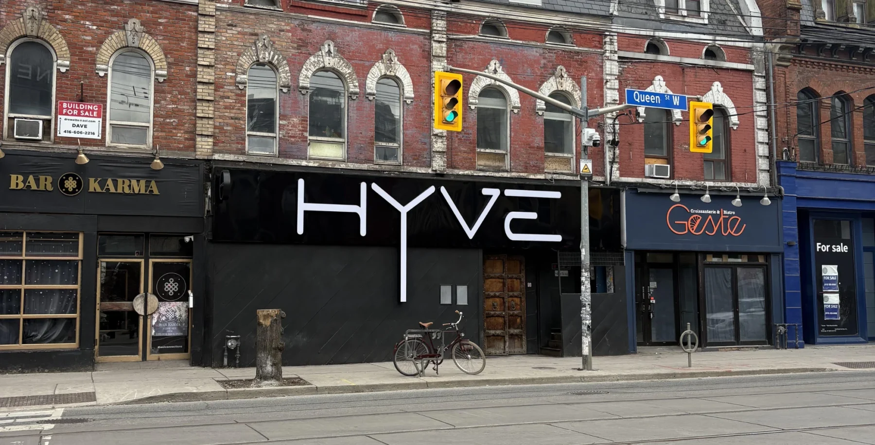 Nightclub on Queen Street Toronto with modern signage, replacing the Velvet Underground venue, reflecting changes in Toronto's nightlife scene.