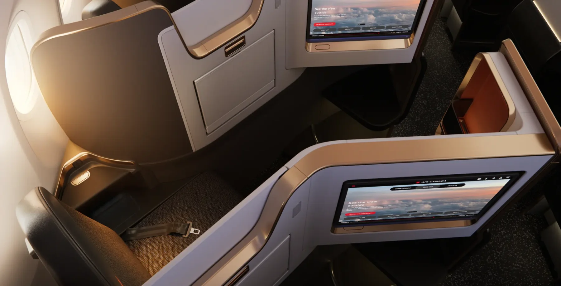 In-flight entertainment screens on airplane seats showing flight information and entertainment options, with a focus on airline travel comfort and amenities.