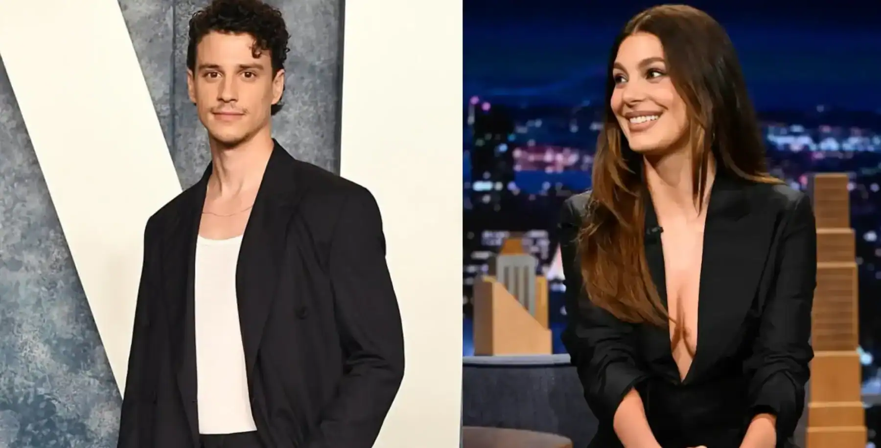 Adam DiMarco and a female co-star smiling during a TV interview, with city lights in the background.
