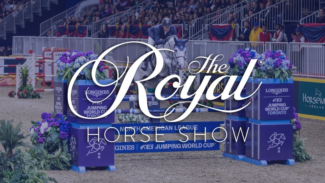 Image of equestrians competing in the Royal Show Jumping event at Toronto Horse Arena, showcasing professional riders and colorful jumps during a high-level show jumping competition.