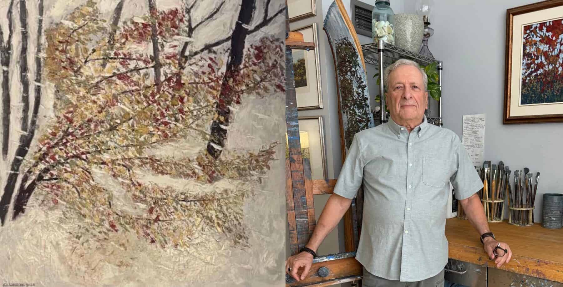 An elderly man standing in an art studio surrounded by paintings, including a large tree artwork, with art supplies on a wooden table.