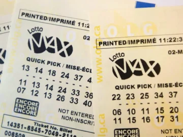 Canadian Lotto MAX quick pick ticket from March 2, 2018, showing selected numbers and purchase details, on a yellow background.